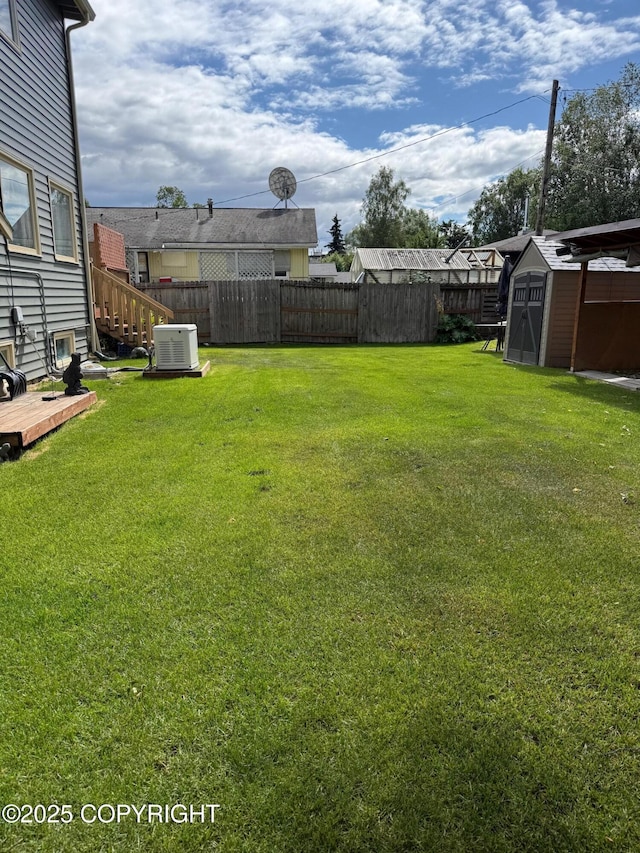 2090 Dimond Dr, Anchorage, AK 99507 - view of yard with a storage shed