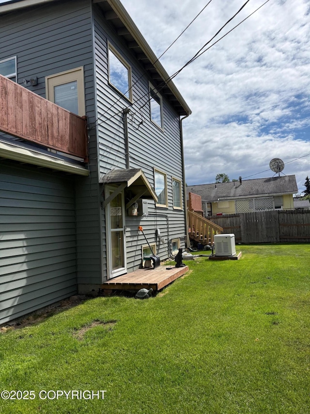 2090 Dimond Dr, Anchorage, AK 99507 - rear view of house featuring a balcony