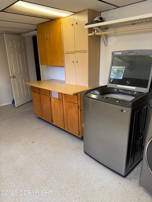 2090 Dimond Dr, Anchorage, AK 99507 - laundry area with cabinet space and washer / dryer