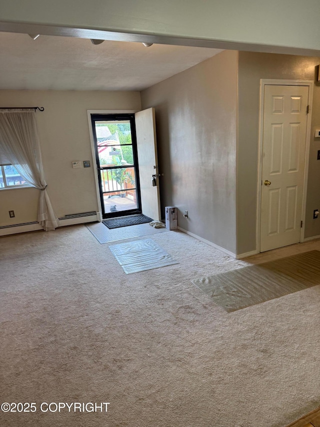 2090 Dimond Dr, Anchorage, AK 99507 - carpeted foyer entrance with baseboards and baseboard heating