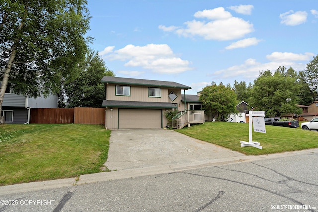 260 N Gloria St, Palmer, AK 99645 - split level home featuring an attached garage and driveway