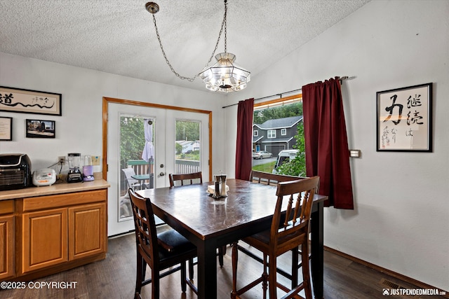 260 N Gloria St, Palmer, AK 99645 - dining area featuring a textured ceiling, french doors, dark wood-type flooring, and a chandelier
