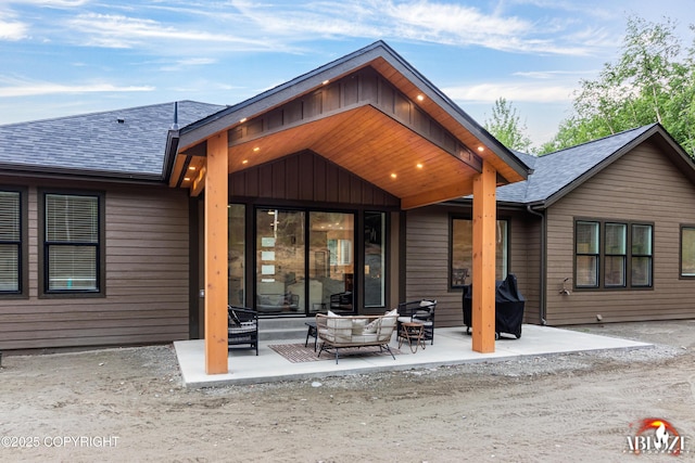 365 W Crestwood Ave, Wasilla, AK 99654 - rear view of property with a shingled roof and a patio