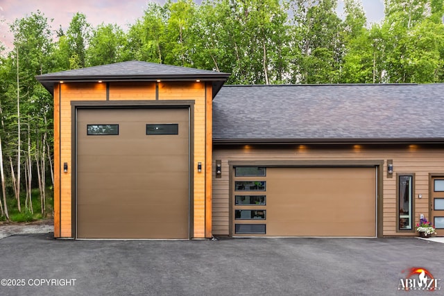 365 W Crestwood Ave, Wasilla, AK 99654 - garage with view of wooded area