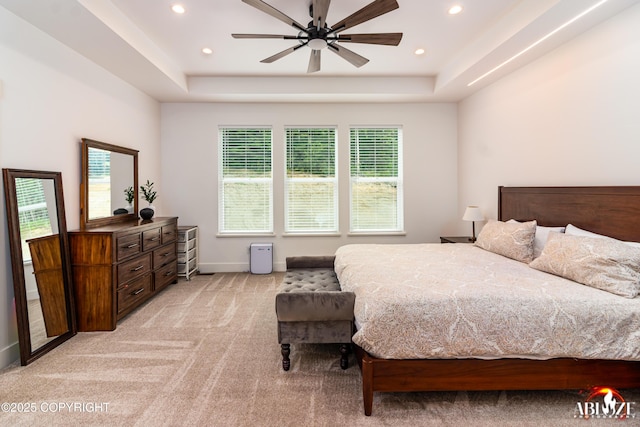 365 W Crestwood Ave, Wasilla, AK 99654 - bedroom with light carpet, a tray ceiling, recessed lighting, and a ceiling fan