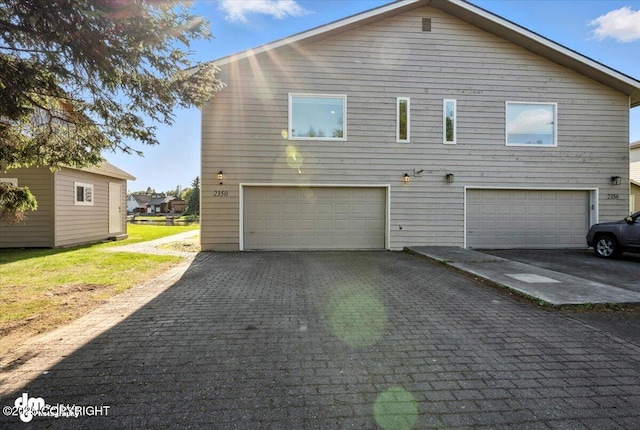 2350 Canary Ct, Anchorage, AK 99515 - view of front of house featuring a garage