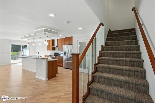 2350 Canary Ct, Anchorage, AK 99515 - staircase with wood finished floors and recessed lighting