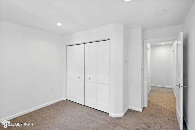 2350 Canary Ct, Anchorage, AK 99515 - unfurnished bedroom with carpet floors, recessed lighting, and a closet