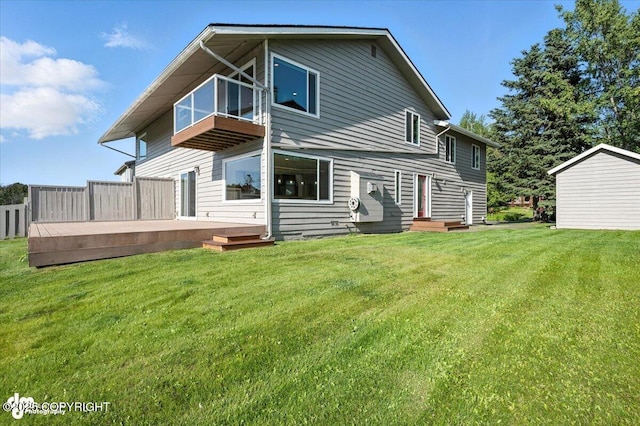 2350 Canary Ct, Anchorage, AK 99515 - back of property with a balcony, a yard, and a wooden deck