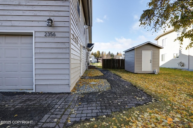2350 Canary Ct, Anchorage, AK 99515 - view of property exterior with a shed