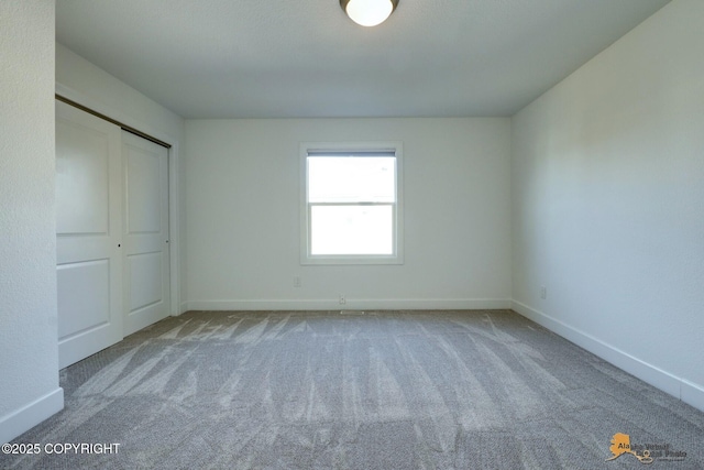 2350 Canary Ct, Anchorage, AK 99515 - unfurnished bedroom with carpet flooring and a closet