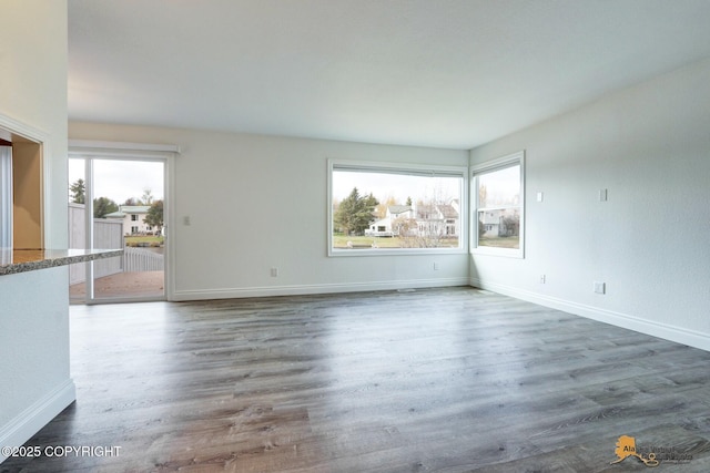 2350 Canary Ct, Anchorage, AK 99515 - unfurnished living room with wood finished floors
