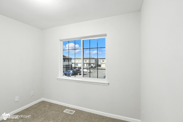 133 Matthew Paul Way, Anchorage, AK 99504 - spare room with baseboards and carpet floors