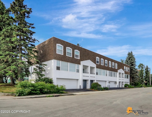 1414 W 7th Ave # 2, Anchorage, AK 99501 - view of property with an attached garage