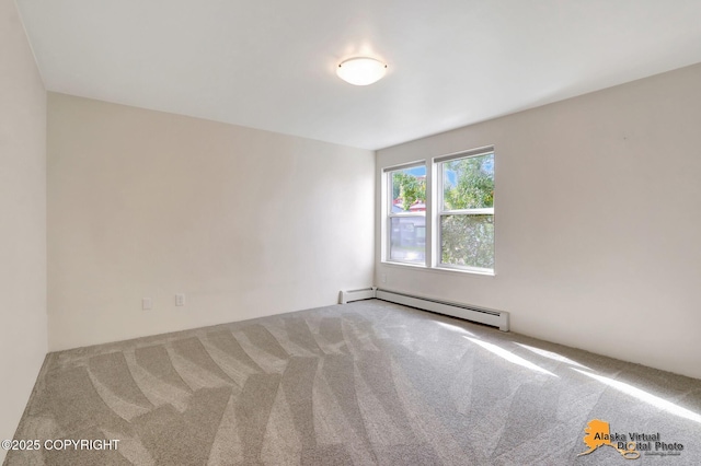 1414 W 7th Ave # 2, Anchorage, AK 99501 - spare room with a baseboard radiator and carpet flooring