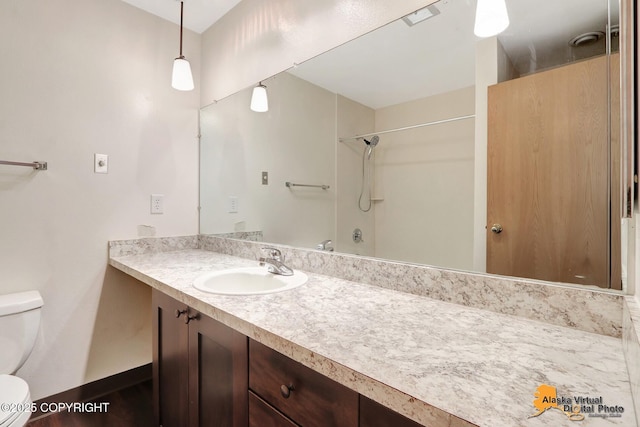 1414 W 7th Ave # 2, Anchorage, AK 99501 - full bathroom featuring toilet and vanity