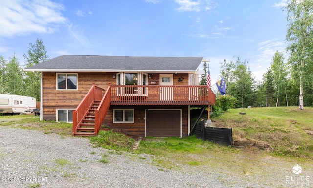 3021 N Arctic Fox Dr, Wasilla, AK 99654 - rustic home with an attached garage, stairway, a deck, driveway, and roof with shingles