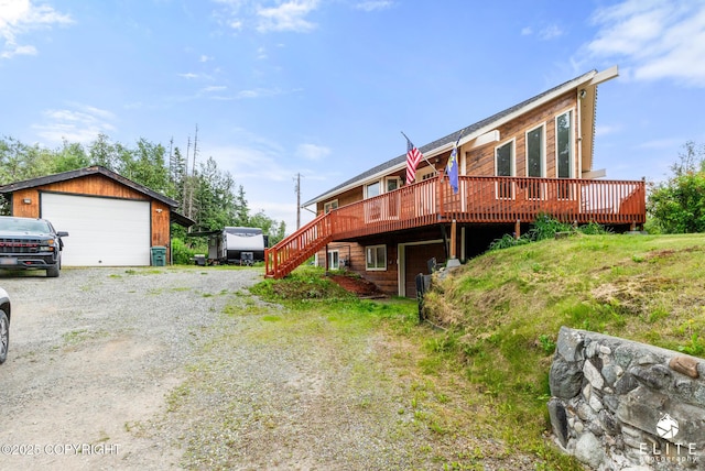 3021 N Arctic Fox Dr, Wasilla, AK 99654 - view of front facade with a deck, stairway, and an outdoor structure