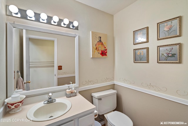 4060 Defiance St, Anchorage, AK 99504 - bathroom with toilet and vanity