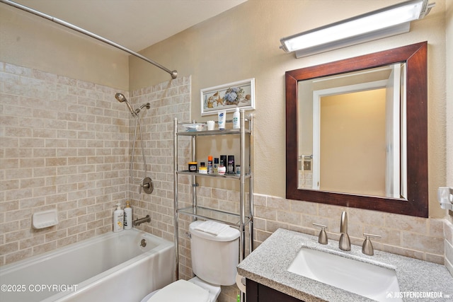 4060 Defiance St, Anchorage, AK 99504 - full bath with tub / shower combination, vanity, and tile walls