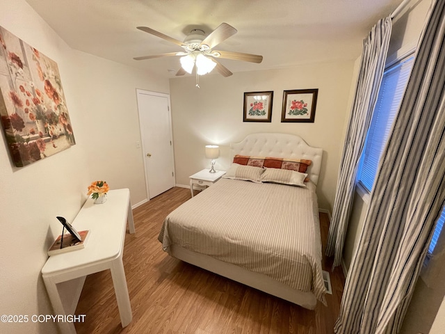4060 Defiance St, Anchorage, AK 99504 - bedroom featuring wood finished floors and ceiling fan