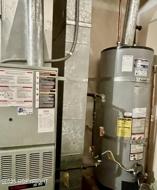 11613 Birch Knoll Loop, Anchorage, AK 99515 - utility room featuring secured water heater