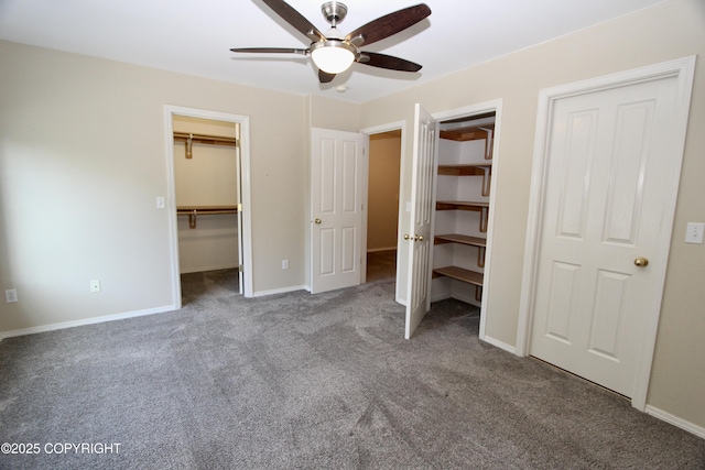 11613 Birch Knoll Loop, Anchorage, AK 99515 - unfurnished bedroom featuring carpet floors, a spacious closet, and a ceiling fan