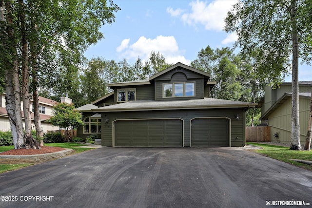 3561 Eastwind Dr, Anchorage, AK 99516 - view of front facade featuring a garage and driveway