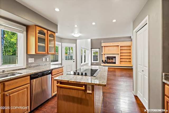 3561 Eastwind Dr, Anchorage, AK 99516 - kitchen with dishwasher, black electric stovetop, a center island, glass insert cabinets, and light stone countertops