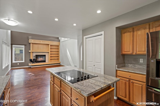 3561 Eastwind Dr, Anchorage, AK 99516 - kitchen with refrigerator with ice dispenser, black electric cooktop, dark wood-type flooring, open floor plan, and light stone counters