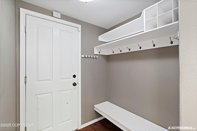 3561 Eastwind Dr, Anchorage, AK 99516 - mudroom featuring dark wood-style floors and baseboards