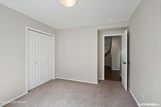 3561 Eastwind Dr, Anchorage, AK 99516 - unfurnished bedroom with carpet flooring and a closet