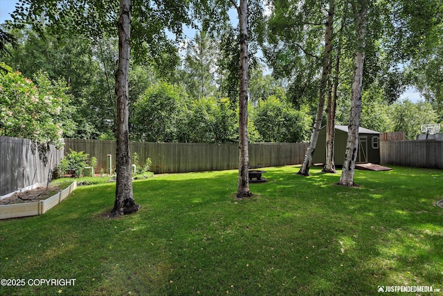 3561 Eastwind Dr, Anchorage, AK 99516 - fenced backyard featuring a storage unit