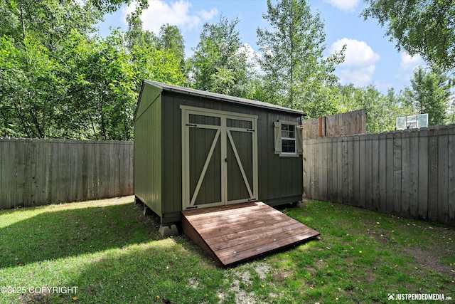 3561 Eastwind Dr, Anchorage, AK 99516 - view of shed with a fenced backyard