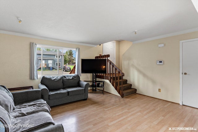 8051 Evans Cir, Anchorage, AK 99507 - living room featuring light wood-type flooring, stairway, and crown molding