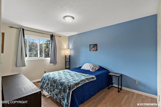8051 Evans Cir, Anchorage, AK 99507 - bedroom featuring wood finished floors