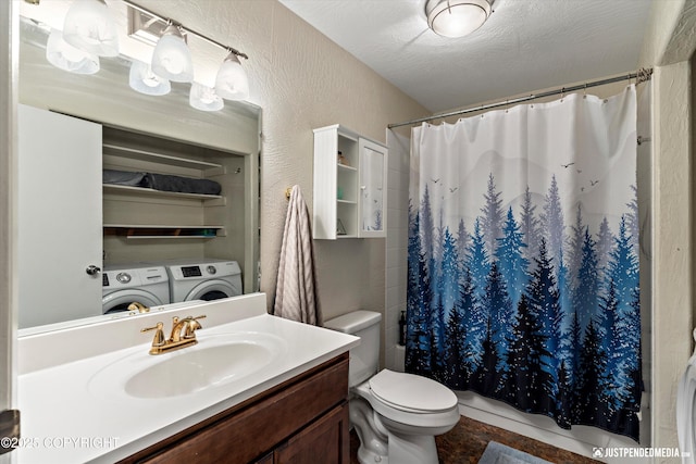 8051 Evans Cir, Anchorage, AK 99507 - bathroom with washer and clothes dryer, vanity, a textured wall, and shower / bathtub combination with curtain
