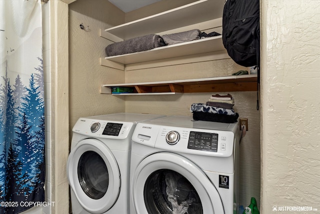 8051 Evans Cir, Anchorage, AK 99507 - laundry room featuring washing machine and clothes dryer and a textured wall