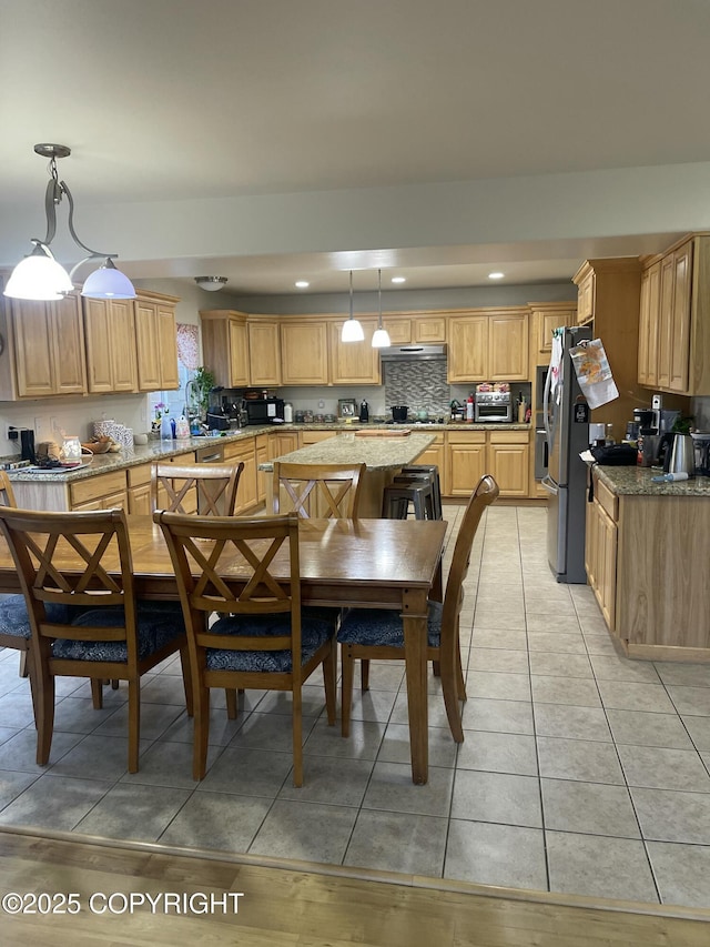 5693 Yukon Charlie Loop, Anchorage, AK 99502 - dining room featuring recessed lighting and light tile patterned floors