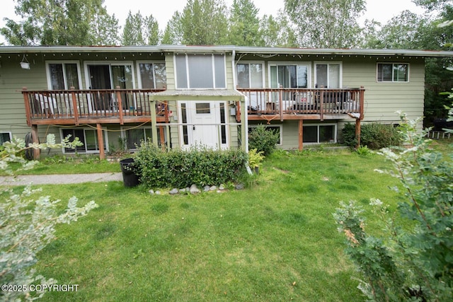 4111 Grape Pl, Anchorage, AK 99508 - rear view of house with a wooden deck and a lawn