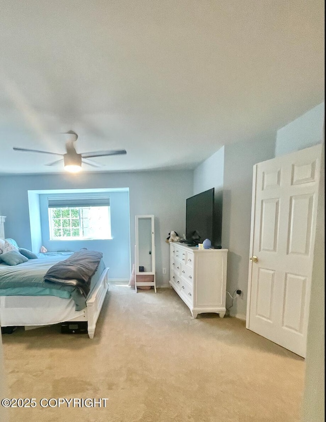 2711 N Woodfield Dr, Wasilla, AK 99654 - bedroom with light carpet and a ceiling fan