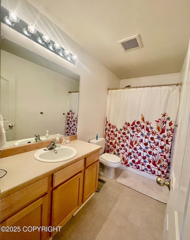 2711 N Woodfield Dr, Wasilla, AK 99654 - bathroom with vanity and tile patterned flooring