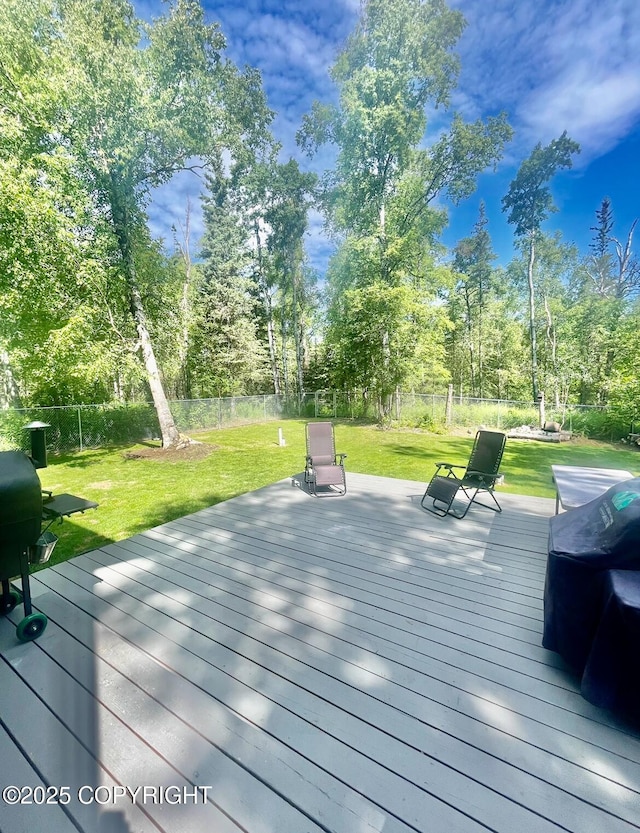 2711 N Woodfield Dr, Wasilla, AK 99654 - wooden terrace with a fenced backyard