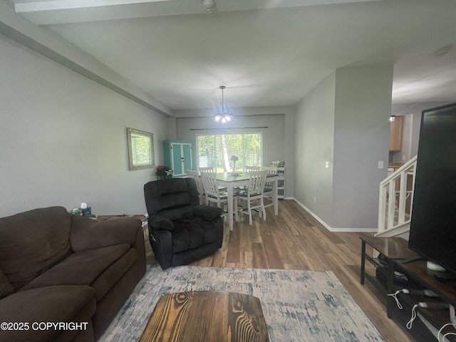 2711 N Woodfield Dr, Wasilla, AK 99654 - living room featuring wood finished floors and stairway