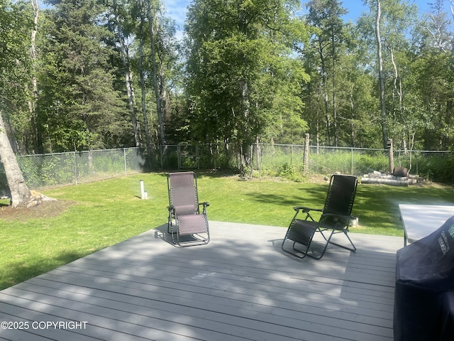 2711 N Woodfield Dr, Wasilla, AK 99654 - deck featuring a fenced backyard and grilling area