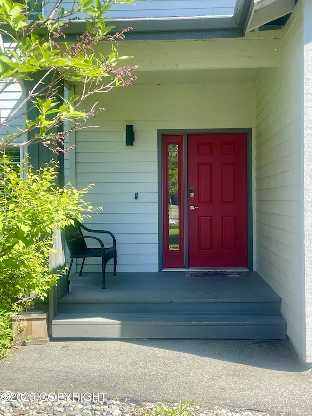 2711 N Woodfield Dr, Wasilla, AK 99654 - view of exterior entry with covered porch