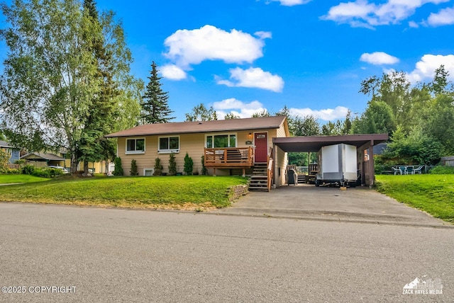 7200 Kiska Cir, Anchorage, AK 99504 - view of front facade with a front lawn, a carport, and driveway