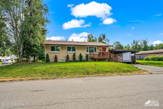 7200 Kiska Cir, Anchorage, AK 99504 - ranch-style house with an attached carport, concrete driveway, a front lawn, and a wooden deck
