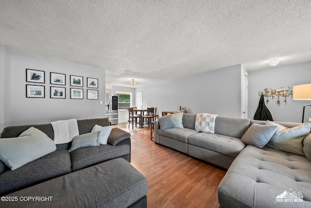 7200 Kiska Cir, Anchorage, AK 99504 - living room with wood finished floors and a textured ceiling
