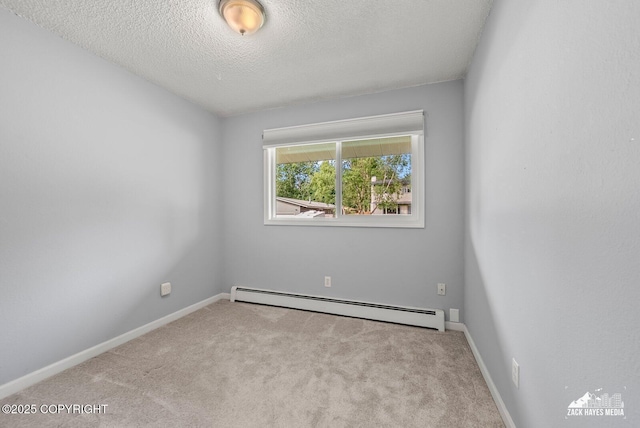 7200 Kiska Cir, Anchorage, AK 99504 - unfurnished room featuring a baseboard radiator, carpet, and a textured ceiling